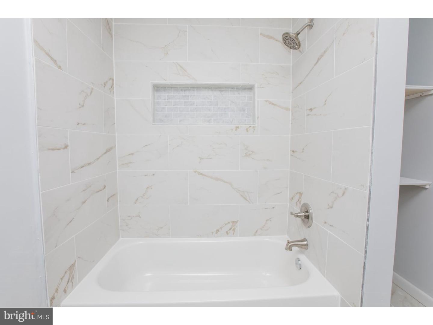810 Coppock Lane Springfield, PA 19064 - Photo 15 of 24 a bathroom with a bathtub