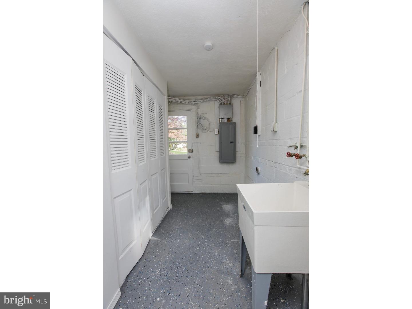 810 Coppock Lane Springfield, PA 19064 - Photo 24 of 24 a view of an empty room with a window