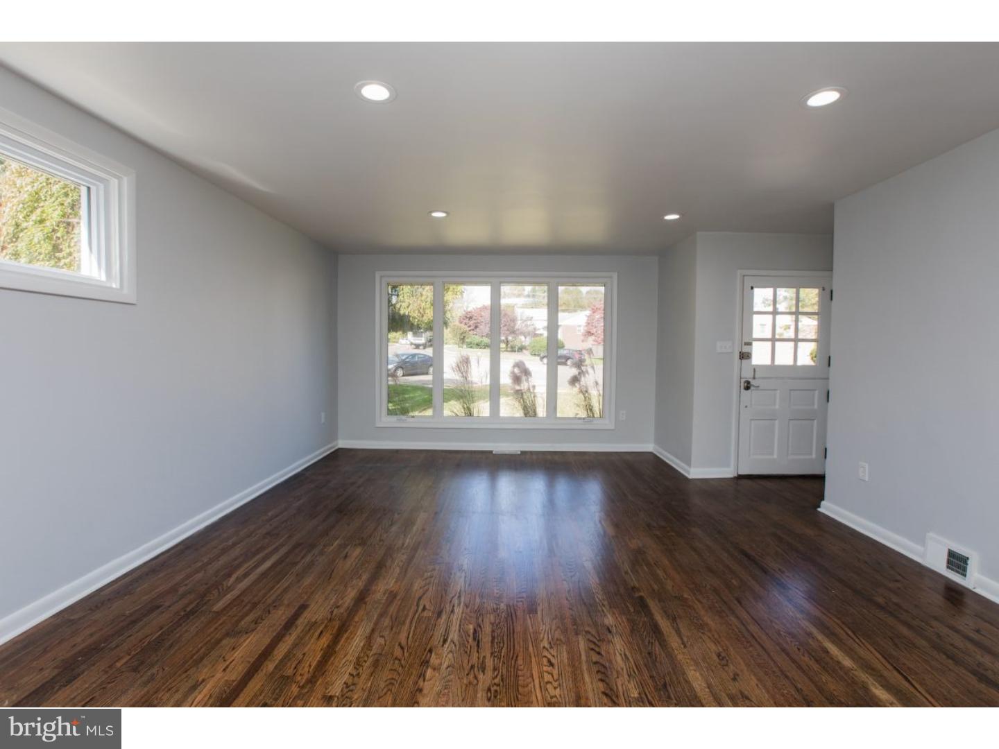 810 Coppock Lane Springfield, PA 19064 - Photo 10 of 24 wooden floor in an empty room with a window