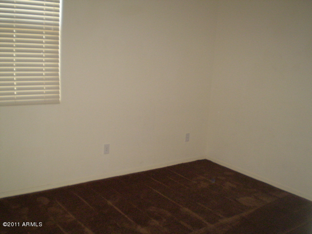 17039 West Southampton Road Surprise, AZ 85374 - Photo 9 of 12 Bedroom