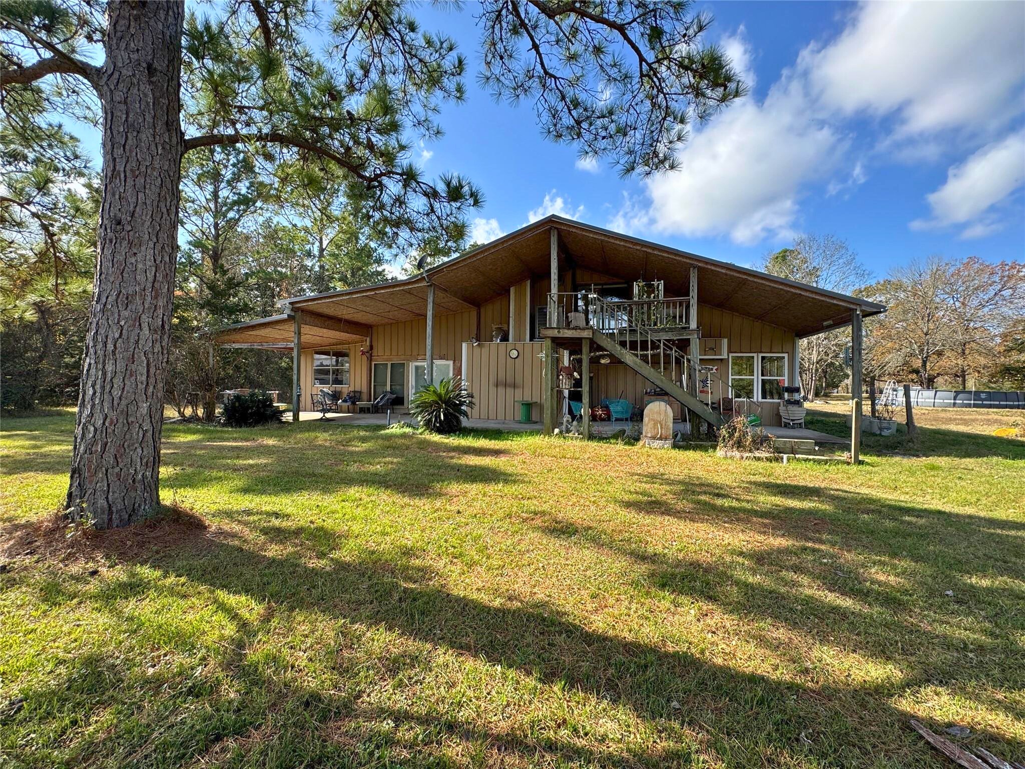 307 Deerwood Drive Trinity, TX 75862 - Photo 1 of 27 If you’ve been looking for a giant home that you can turn into your own masterpiece. This is it. 3 Bedrooms 2 baths on 2.6 acres in a gated community with LOW POA DUES, close to the Lake. What more could you ask for? Need more than 3 bedroom? You could do it. There is a den that could EASILY be made into a bedroom, craft room, play room, or more!