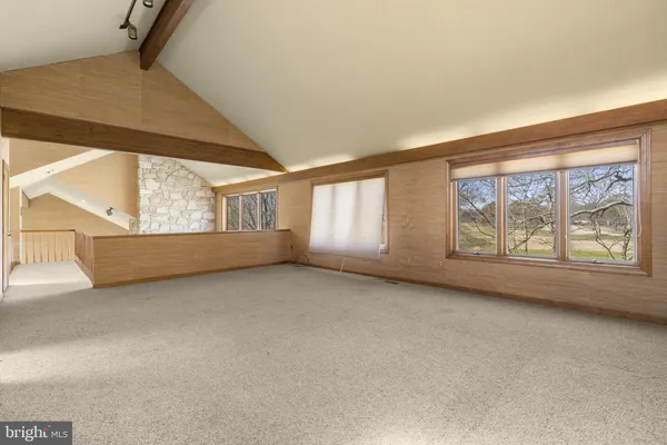 an empty room with windows