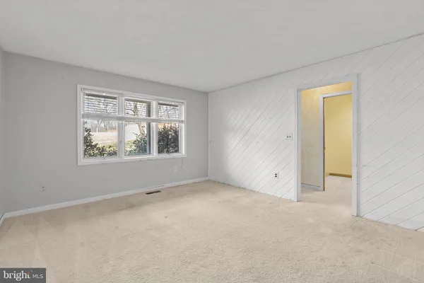 an empty room with a window