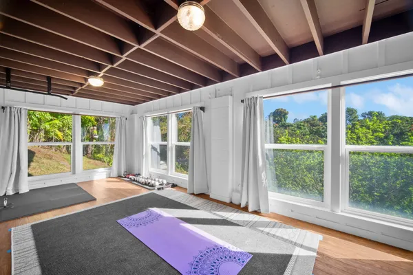 a bed room with a balcony