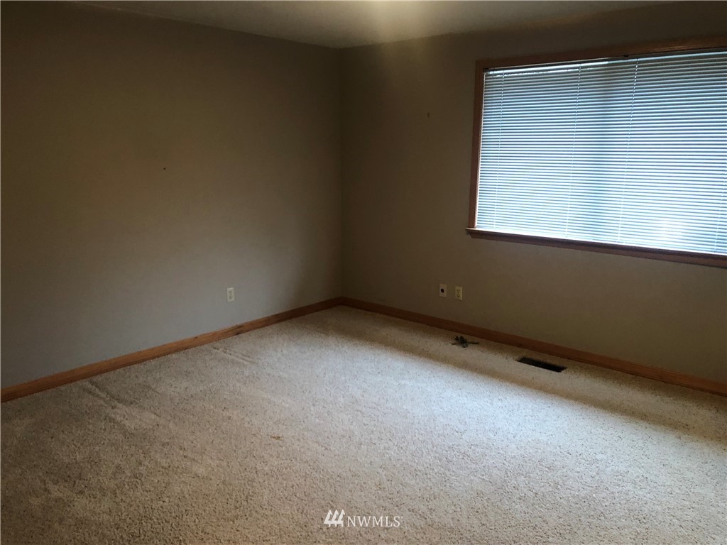 29816 Webster Road East Graham, WA 98338 - Photo 22 of 40 a view of an empty room with a window