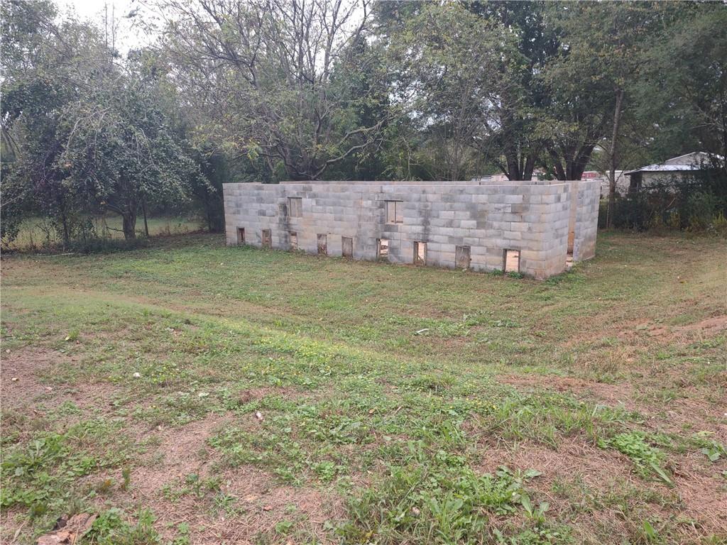 907 Gadsden Road Southwest Cave Spring, GA 30124 - Photo 23 of 26 a backyard of a house with lots of green space