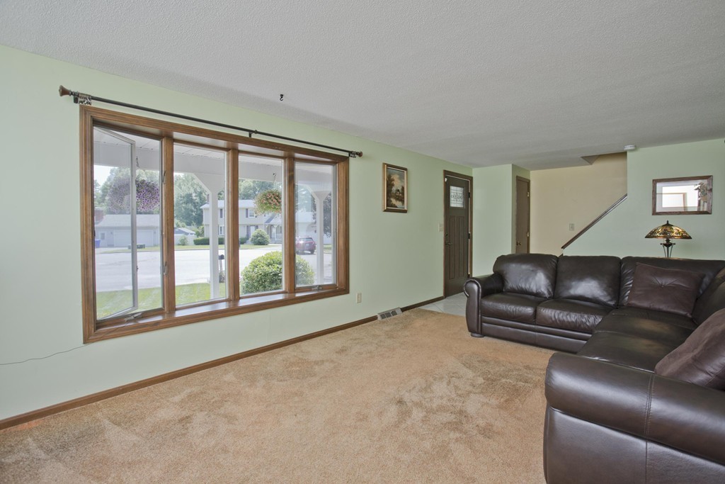 97 Calley Street Springfield, MA 01129 - Photo 14 of 30 a living room with furniture and a large window