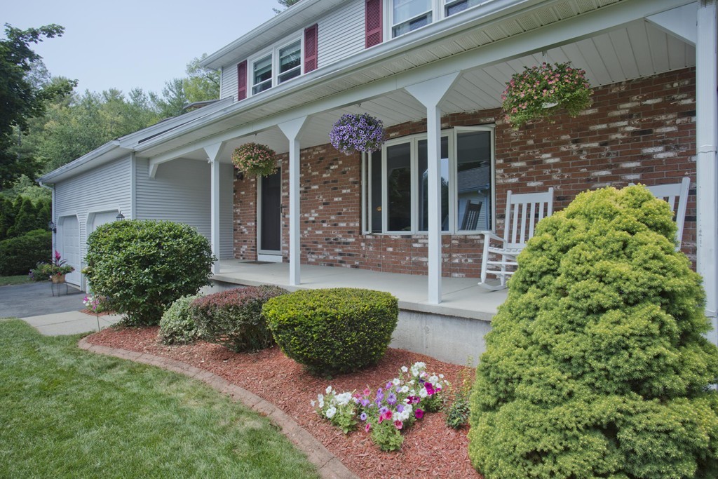 97 Calley Street Springfield, MA 01129 - Photo 2 of 30 front view of a house with a yard