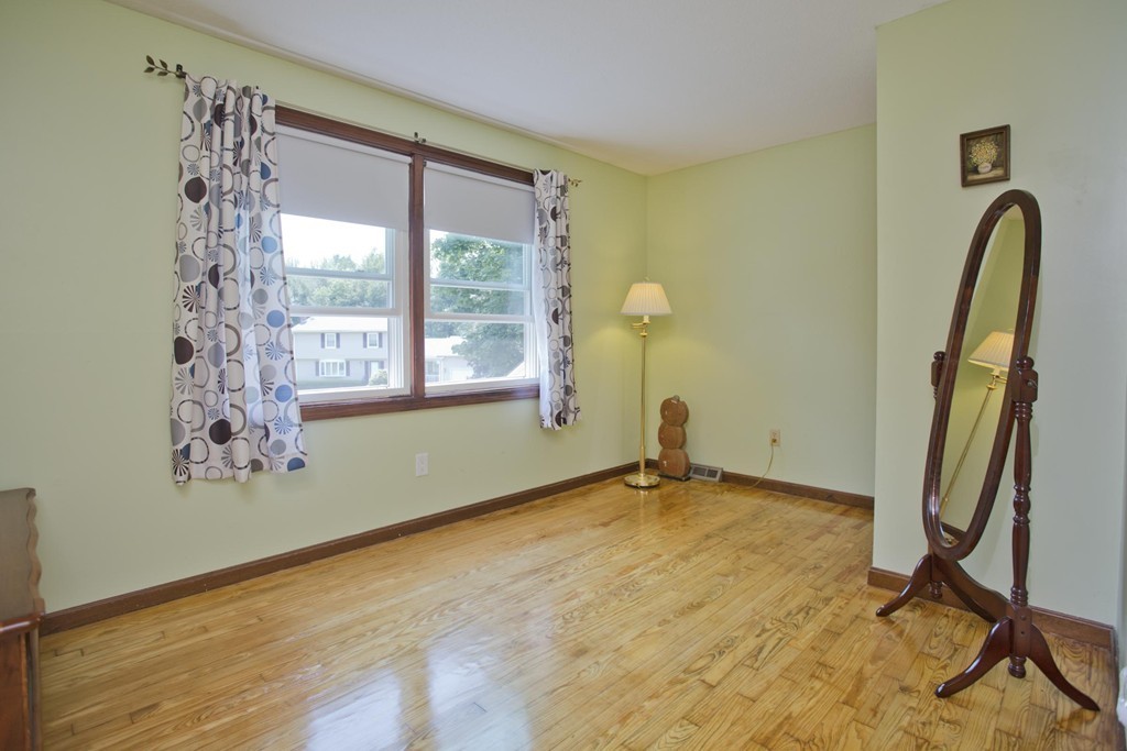 97 Calley Street Springfield, MA 01129 - Photo 25 of 30 a view of a room with window and stairs