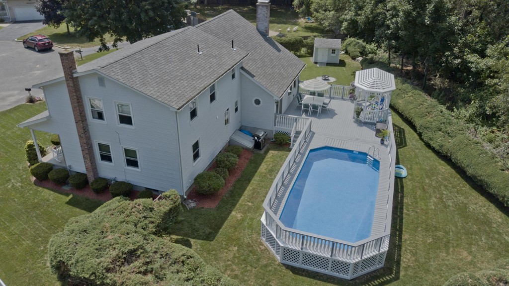 97 Calley Street Springfield, MA 01129 - Photo 3 of 30 an aerial view of a house roof deck and garden