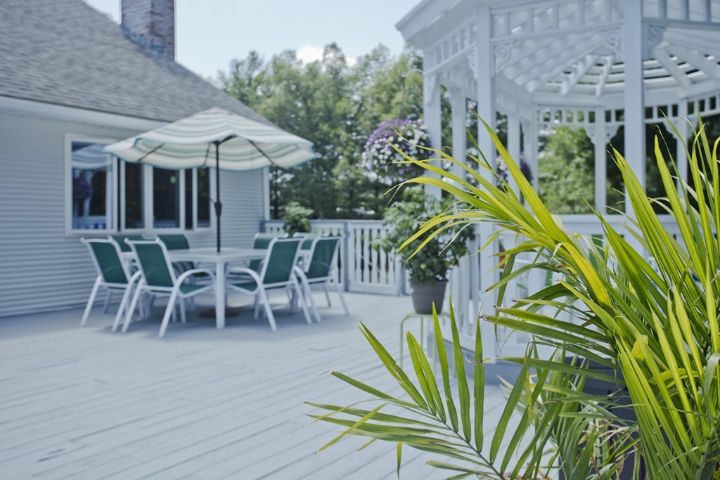 97 Calley Street Springfield, MA 01129 - Photo 7 of 30 a view of a chairs and table in a patio