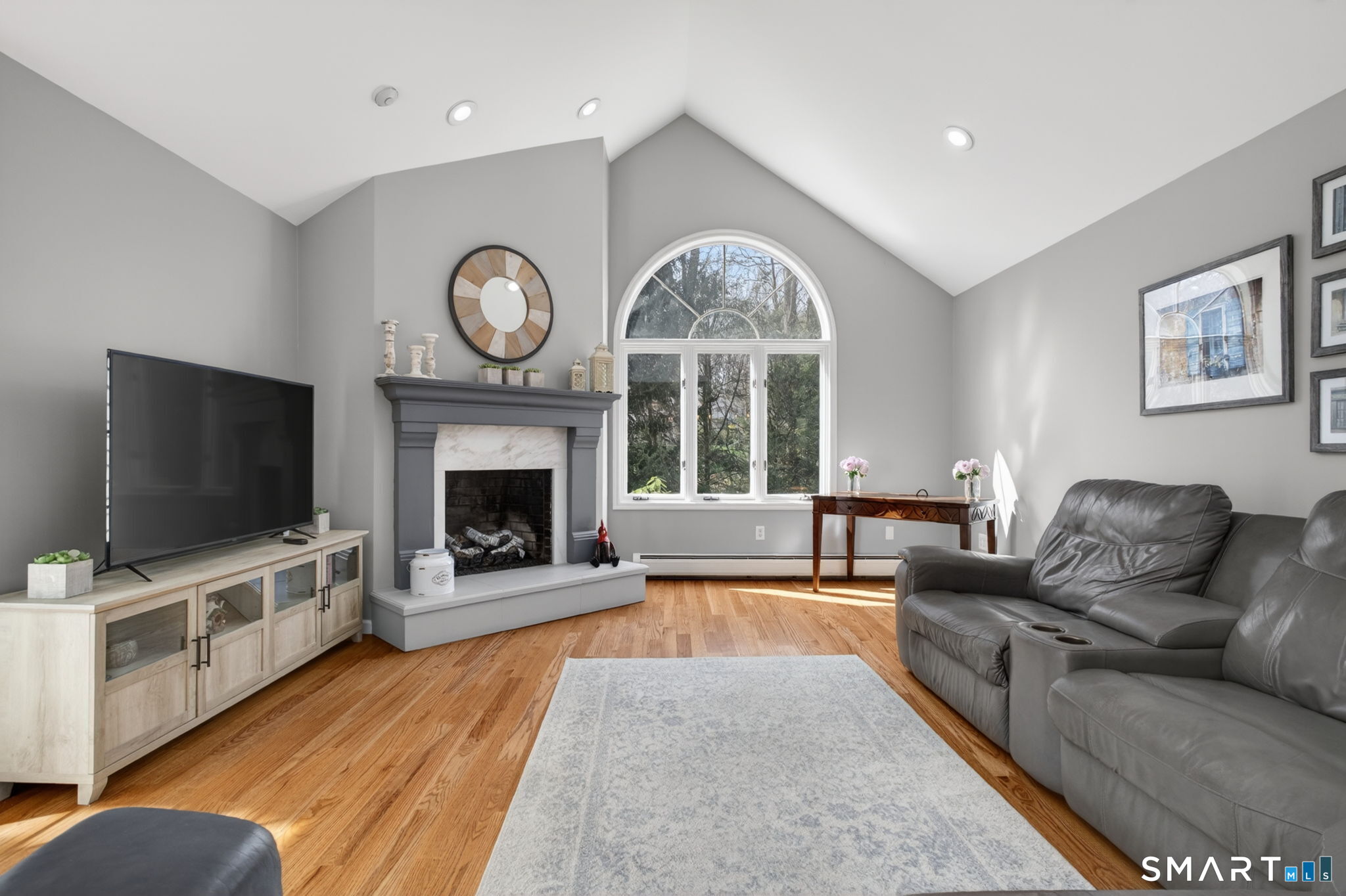 2 Davis Road Woodbridge, CT 06525 - Photo 19 of 40 STUNNING FAMILY ROOM WITH FRENCH DOORS TO DECK AND GAS FIREPLACE