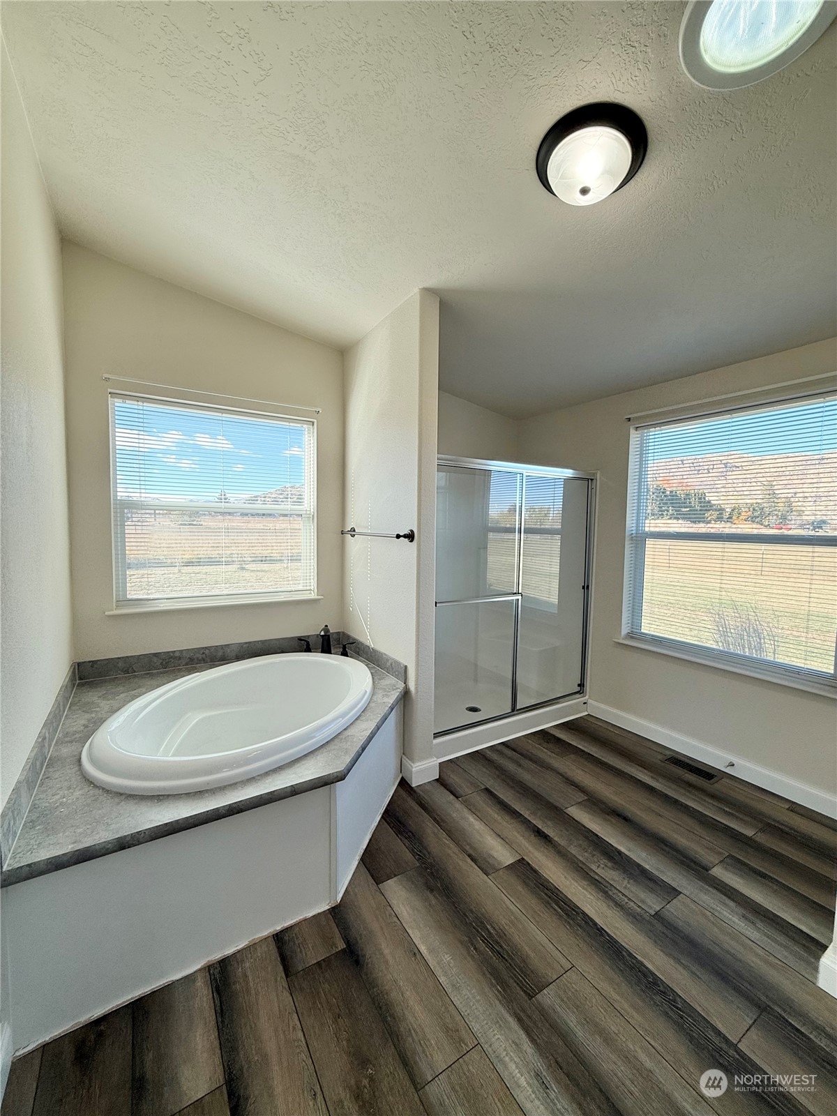 18 Root Road Okanogan, WA 98840 - Photo 23 of 36 a bathroom with a toilet a sink and mirror