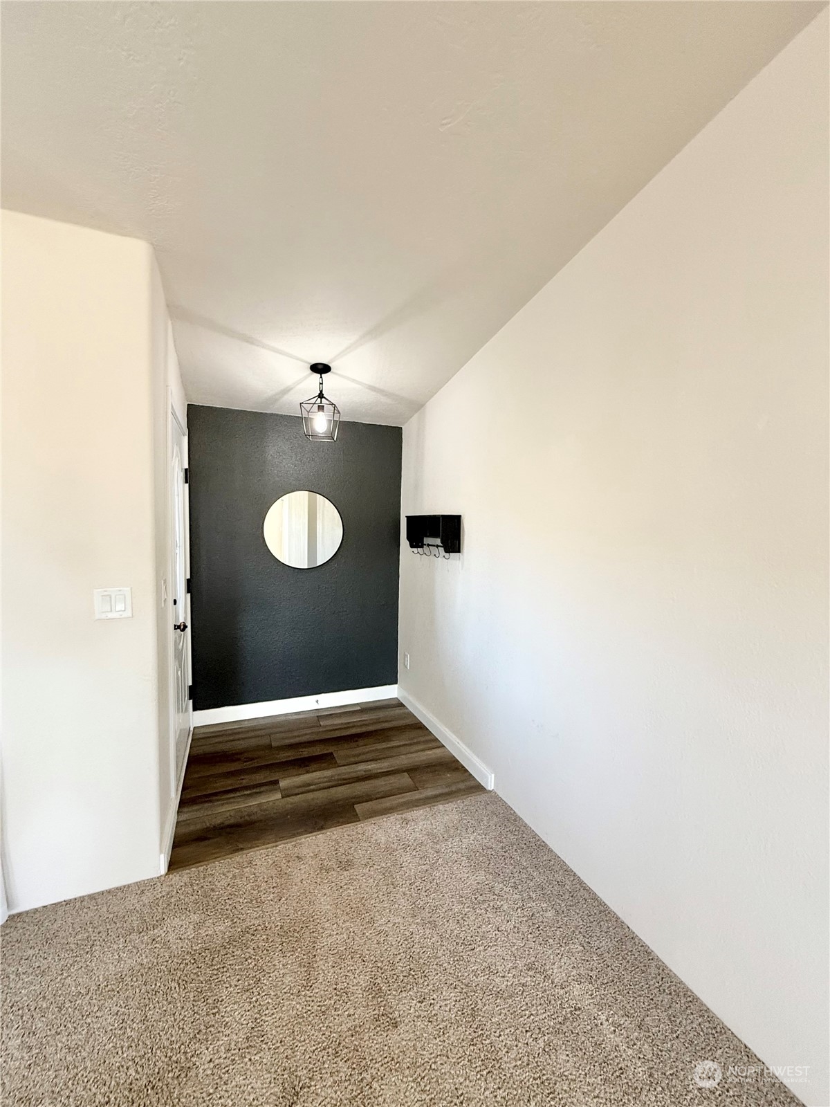 18 Root Road Okanogan, WA 98840 - Photo 3 of 36 a view of an empty room and a window