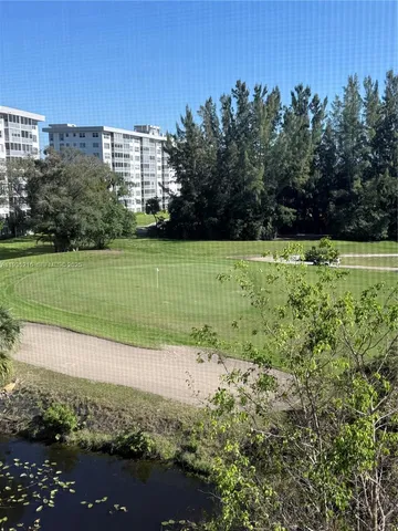a bathroom with a shower and a toilet