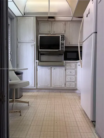 a room with furniture and gym equipment