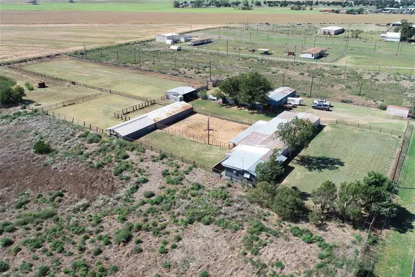 a view of swimming pool with outdoor seating