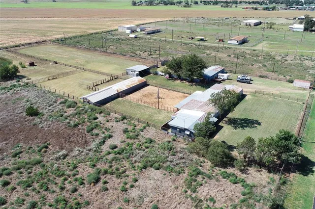 a view of swimming pool with outdoor seating