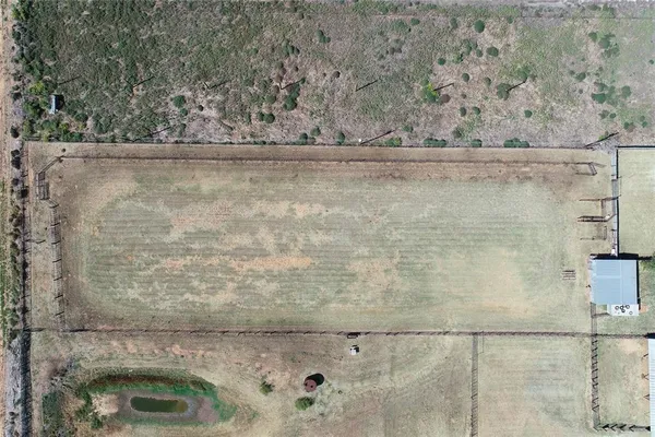 a swimming pool with wooden fence