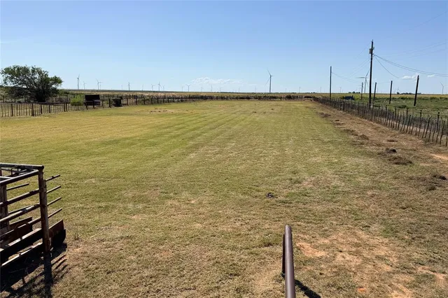a view of a swimming pool and an outdoor space