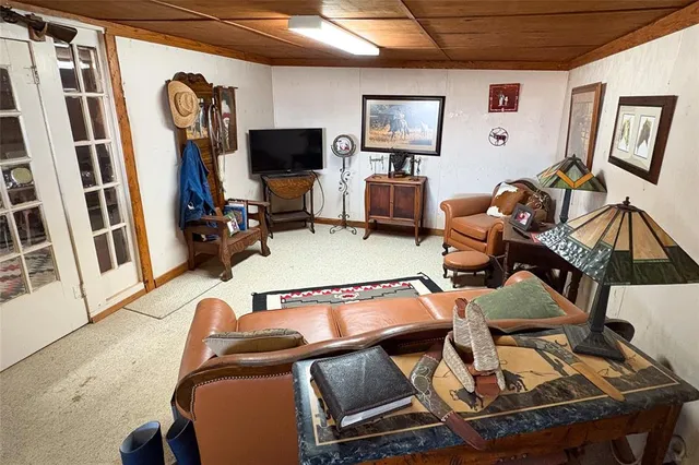 a bathroom with a toilet a sink and a mirror