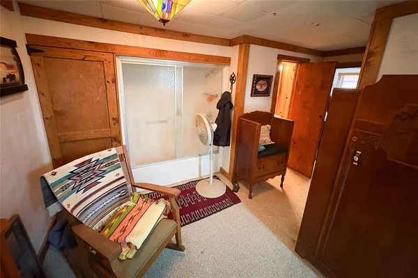 a picture of a room with a window