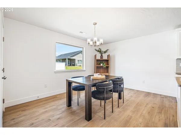 a spacious bedroom with a bed and a window