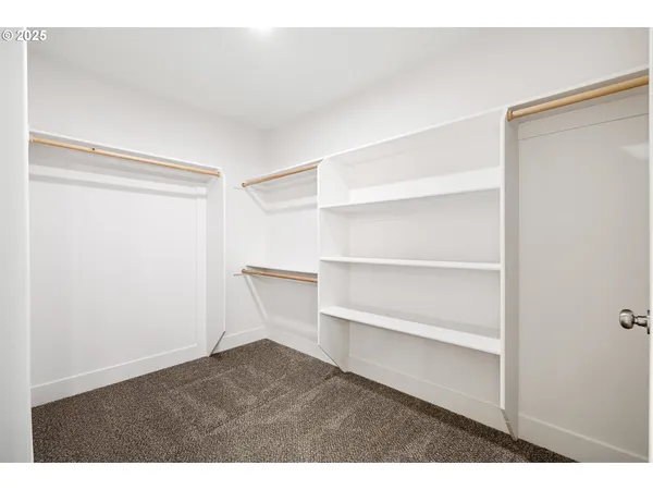 a en suite bathroom with a sink and a mirror