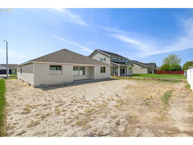 a view of a house with a swimming pool