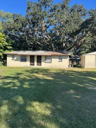 a house view with a swimming pool