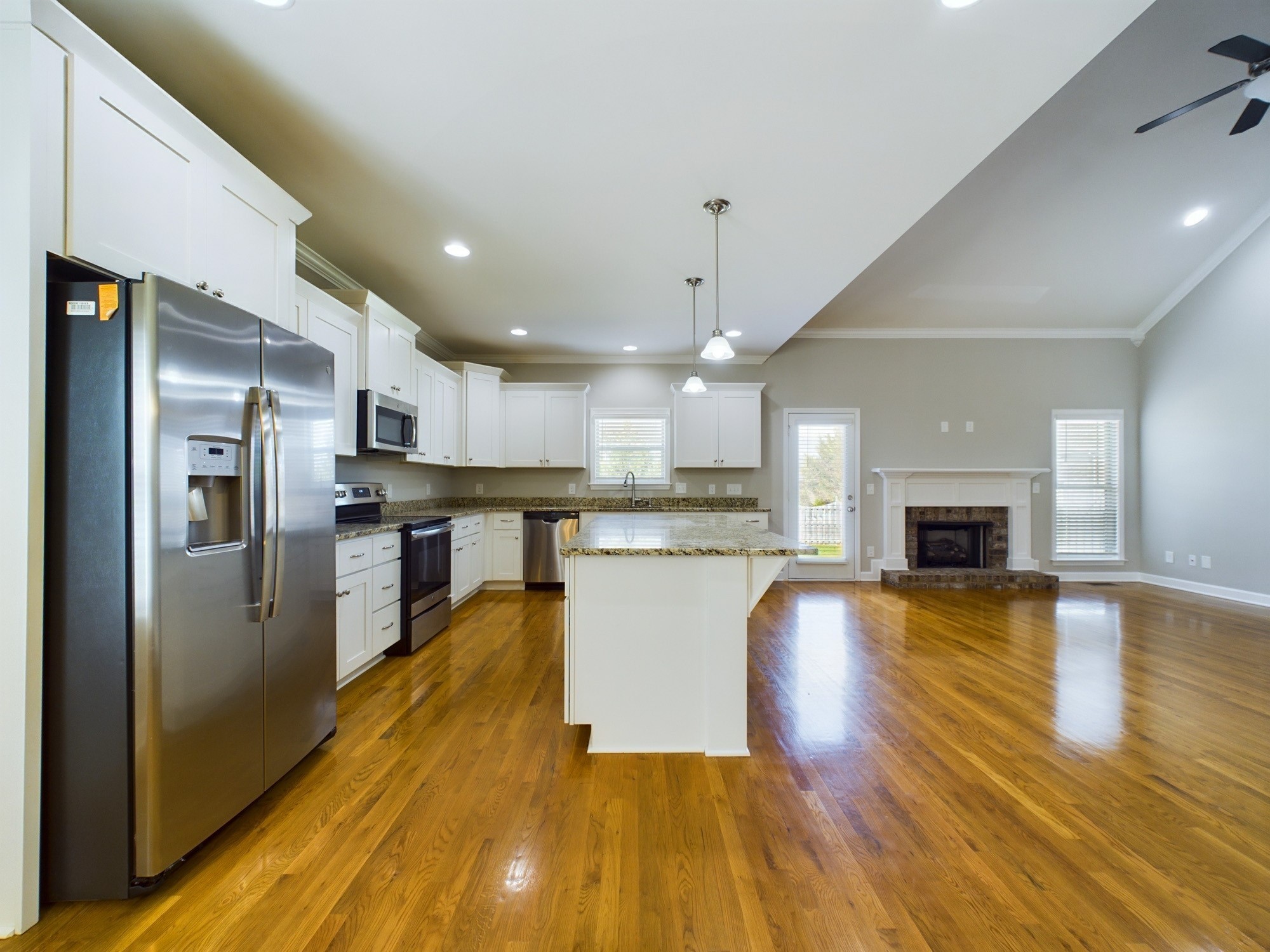 6001 Spade Drive Spring Hill, TN 37174 - Photo 11 of 31 a large kitchen with a lot of counter space and stainless steel appliances