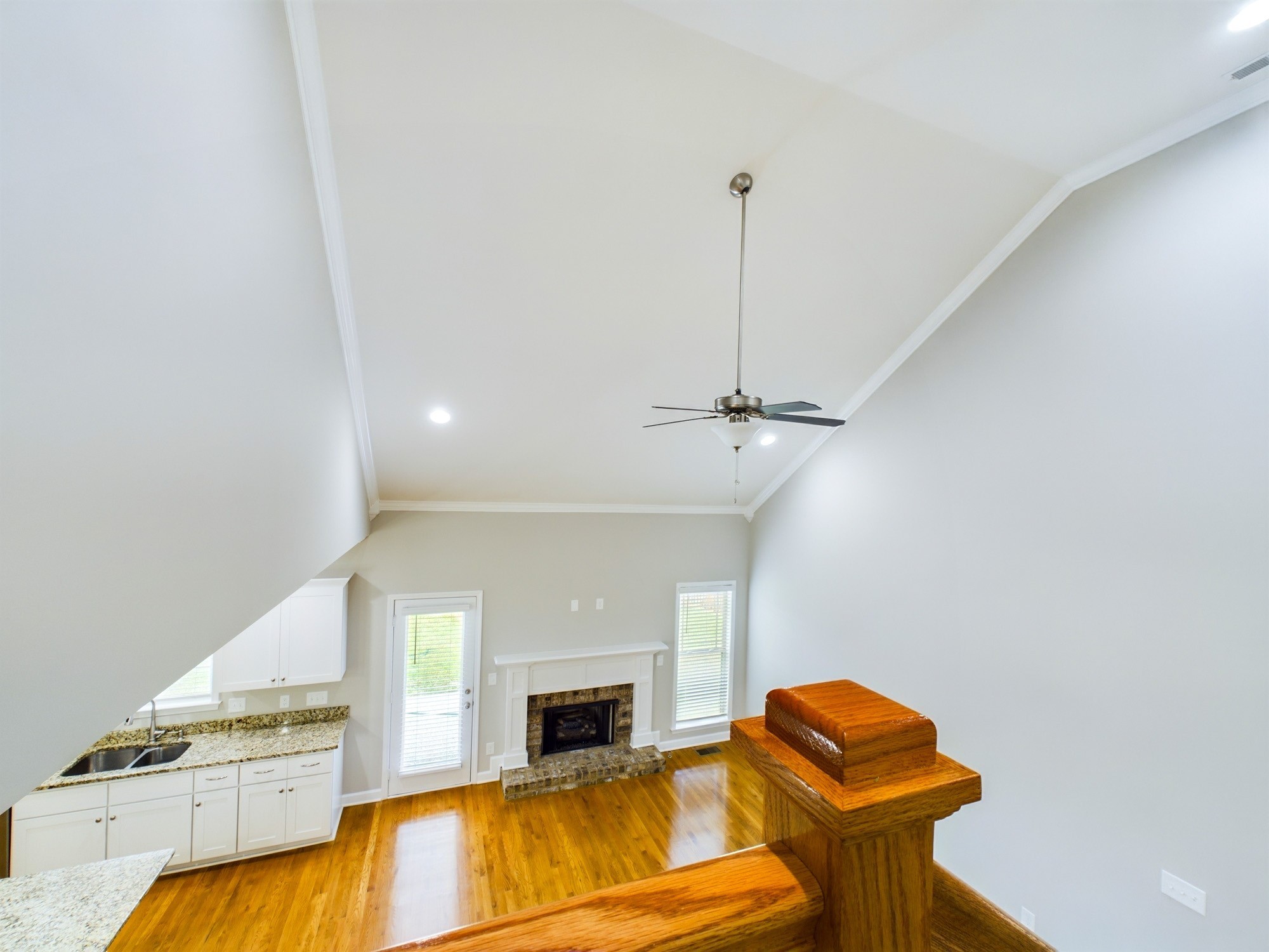 6001 Spade Drive Spring Hill, TN 37174 - Photo 20 of 31 a view of a kitchen with furniture and a fireplace