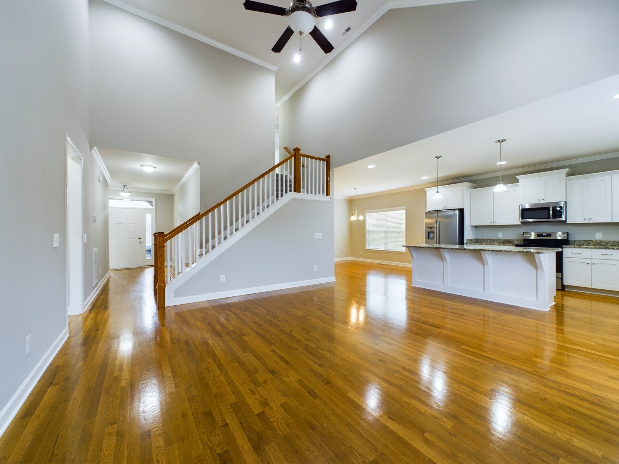 6001 Spade Drive Spring Hill, TN 37174 - Photo 8 of 31 a view of kitchen and dining room with wooden floor