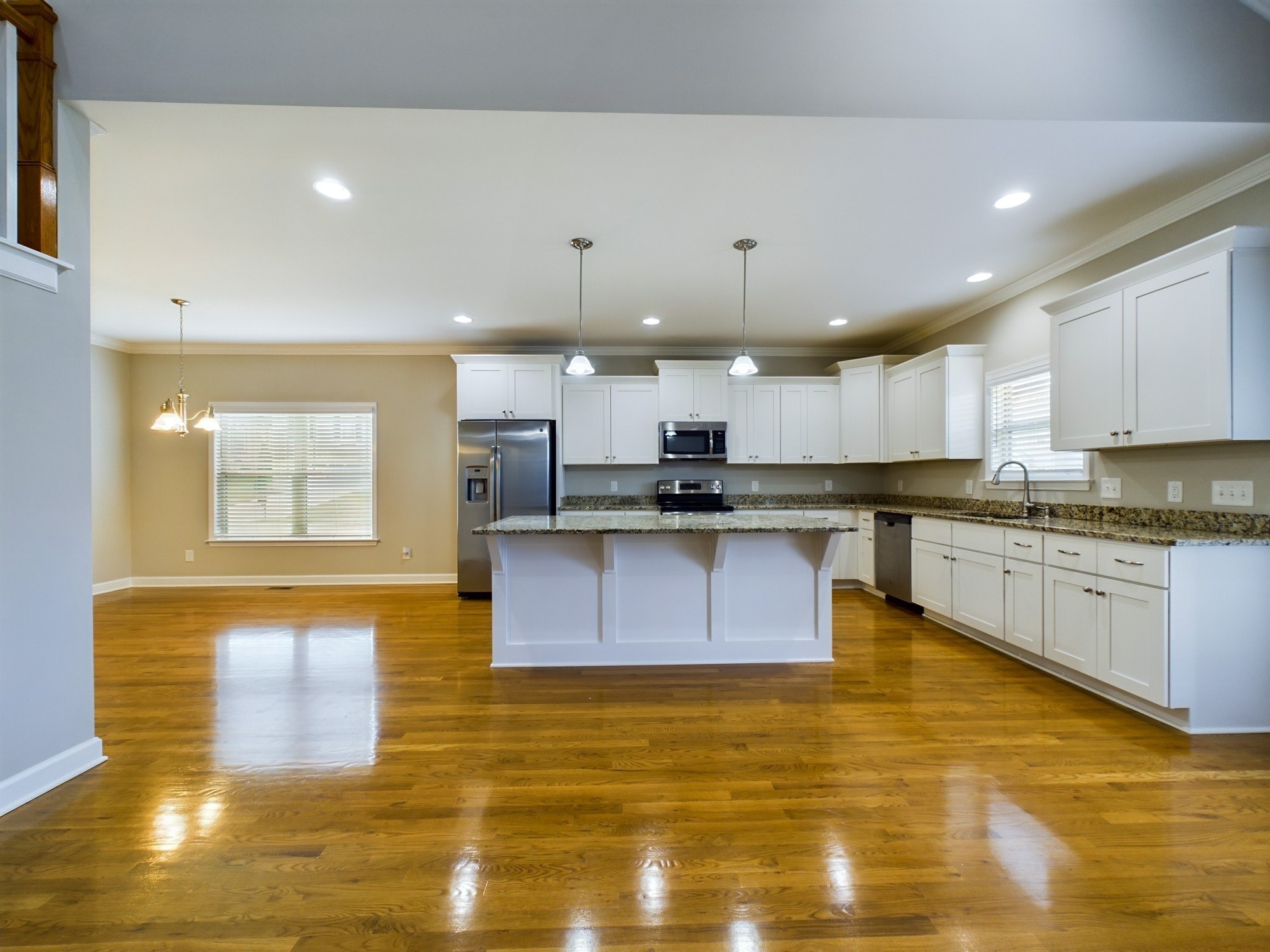 6001 Spade Drive Spring Hill, TN 37174 - Photo 9 of 31 a large kitchen with stainless steel appliances granite countertop a sink and cabinets