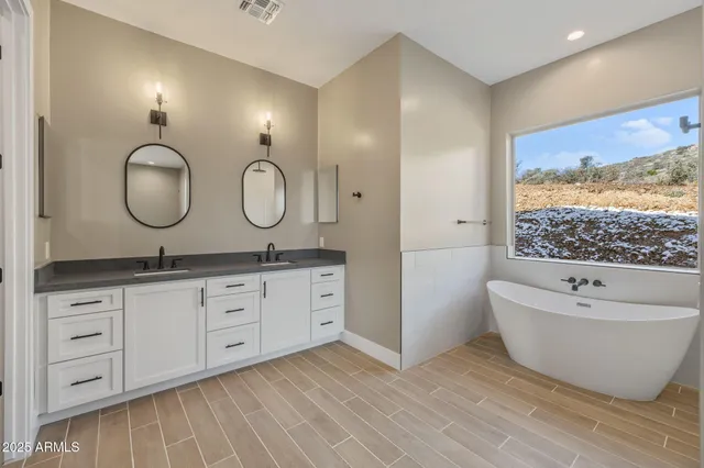 a view of a big yard next to a lake