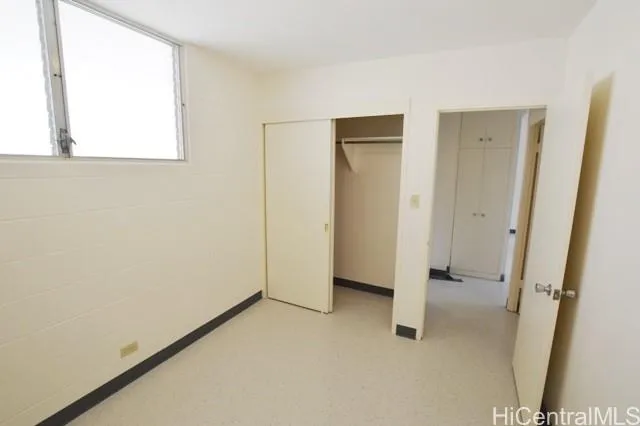 a view of a room with a wardrobe space