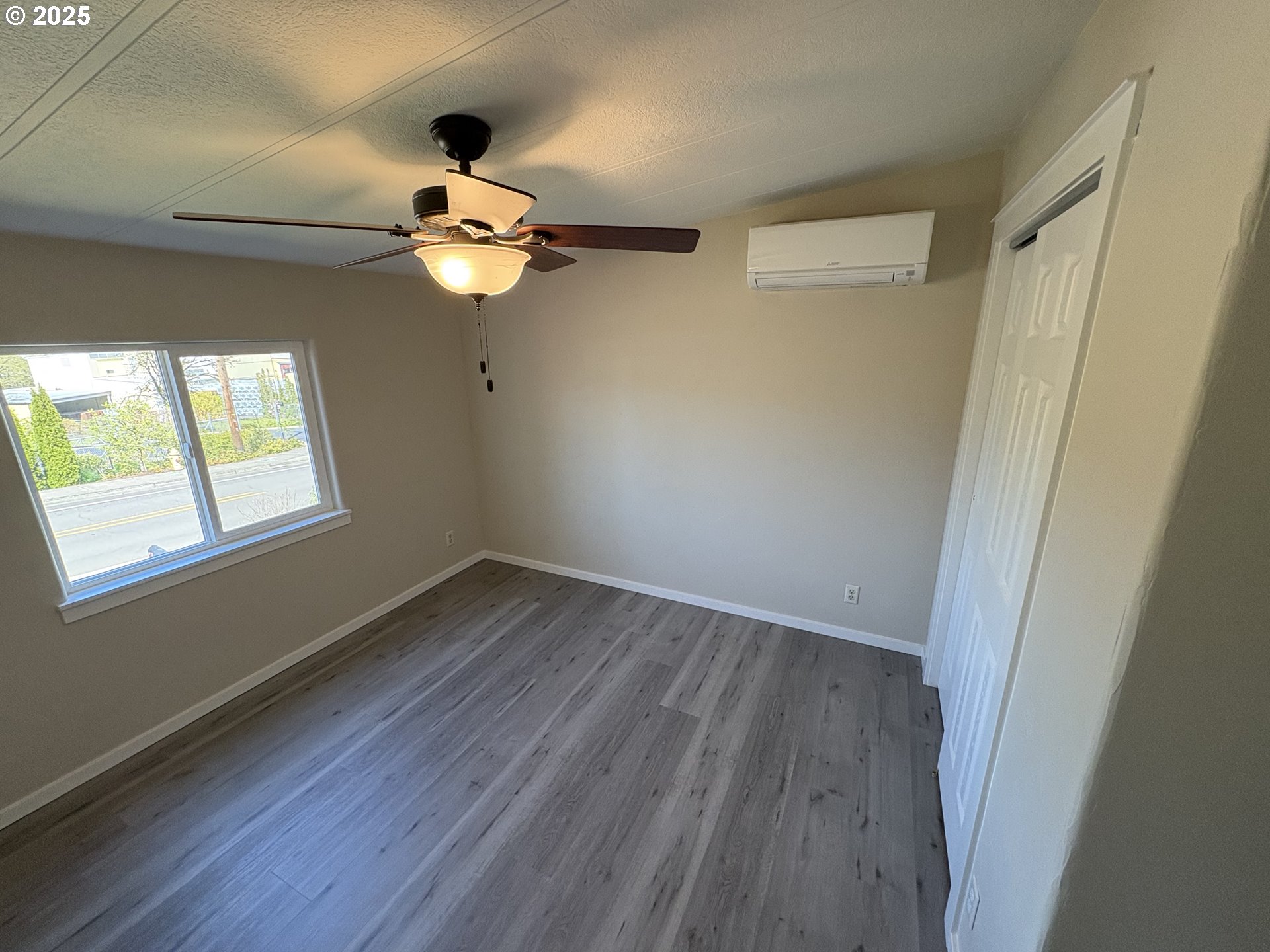 605 South 2nd Street Springfield, OR 97477 - Photo 12 of 20 a view of empty room with wooden floor