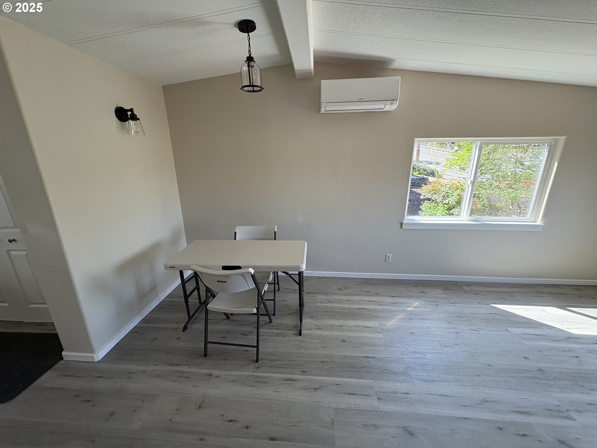 605 South 2nd Street Springfield, OR 97477 - Photo 6 of 20 a view of a room with a wooden table and chair