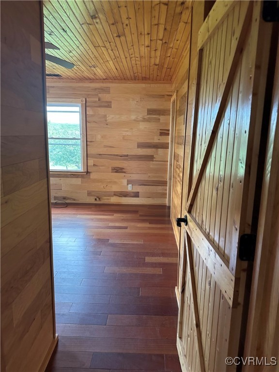 860 Allens Lake Road Dillwyn, VA 23936 - Photo 39 of 47 Unfurnished room featuring wood walls, dark wood-t