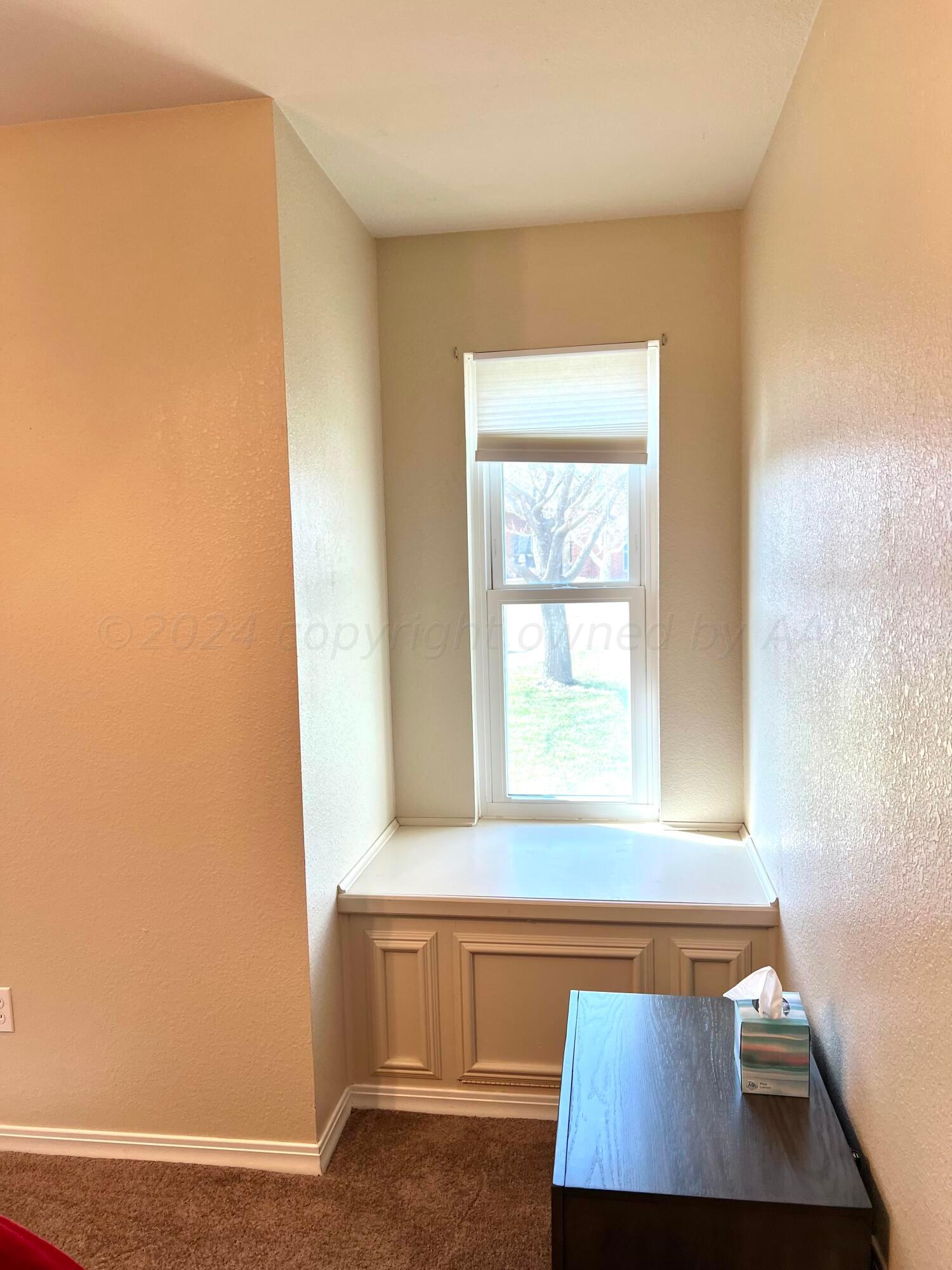 5801 South Bowie Street Amarillo, TX 79118 - Photo 14 of 23 a view of an empty room with a window