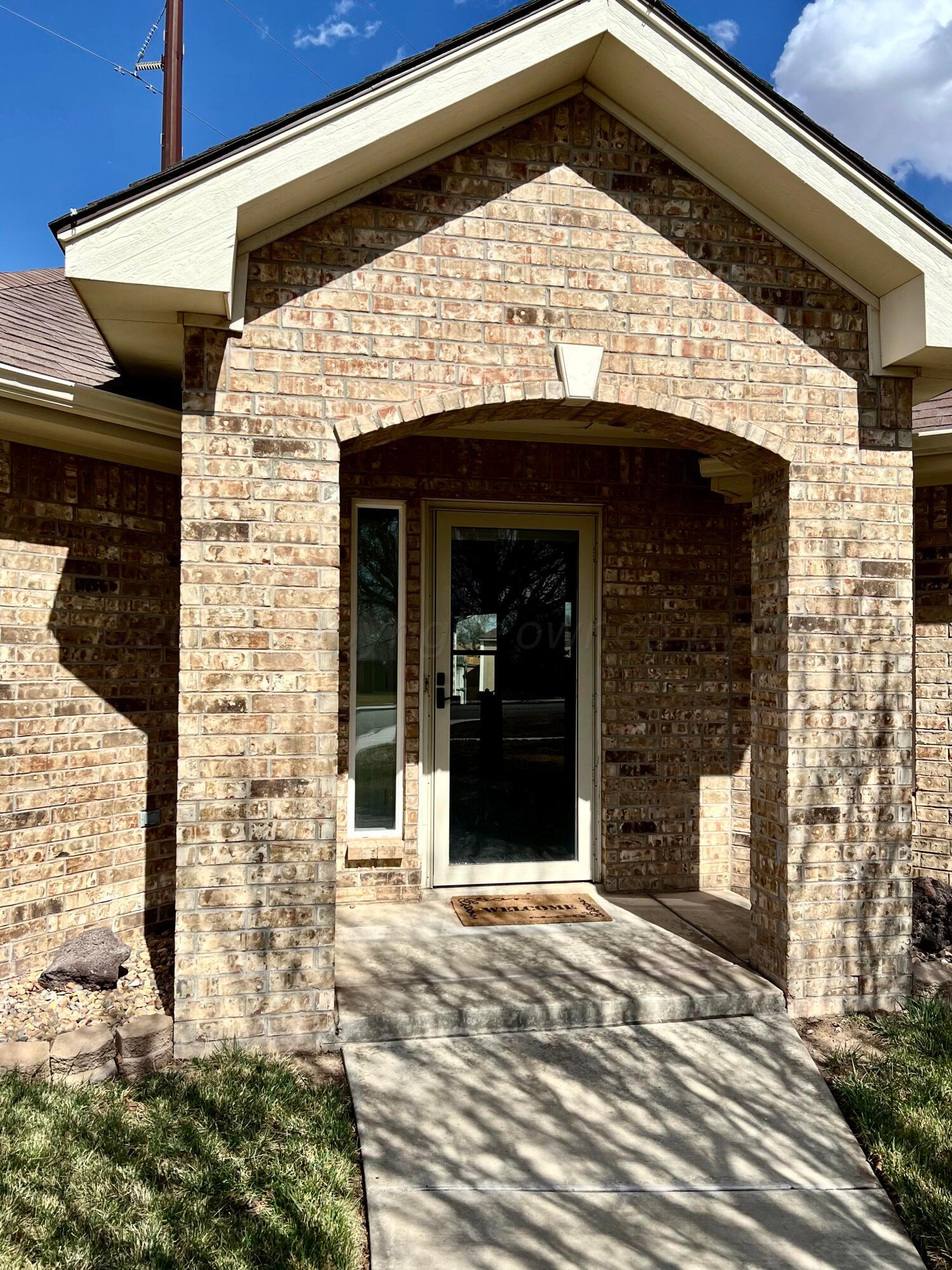 5801 South Bowie Street Amarillo, TX 79118 - Photo 3 of 23 a view of a entryway door front of house