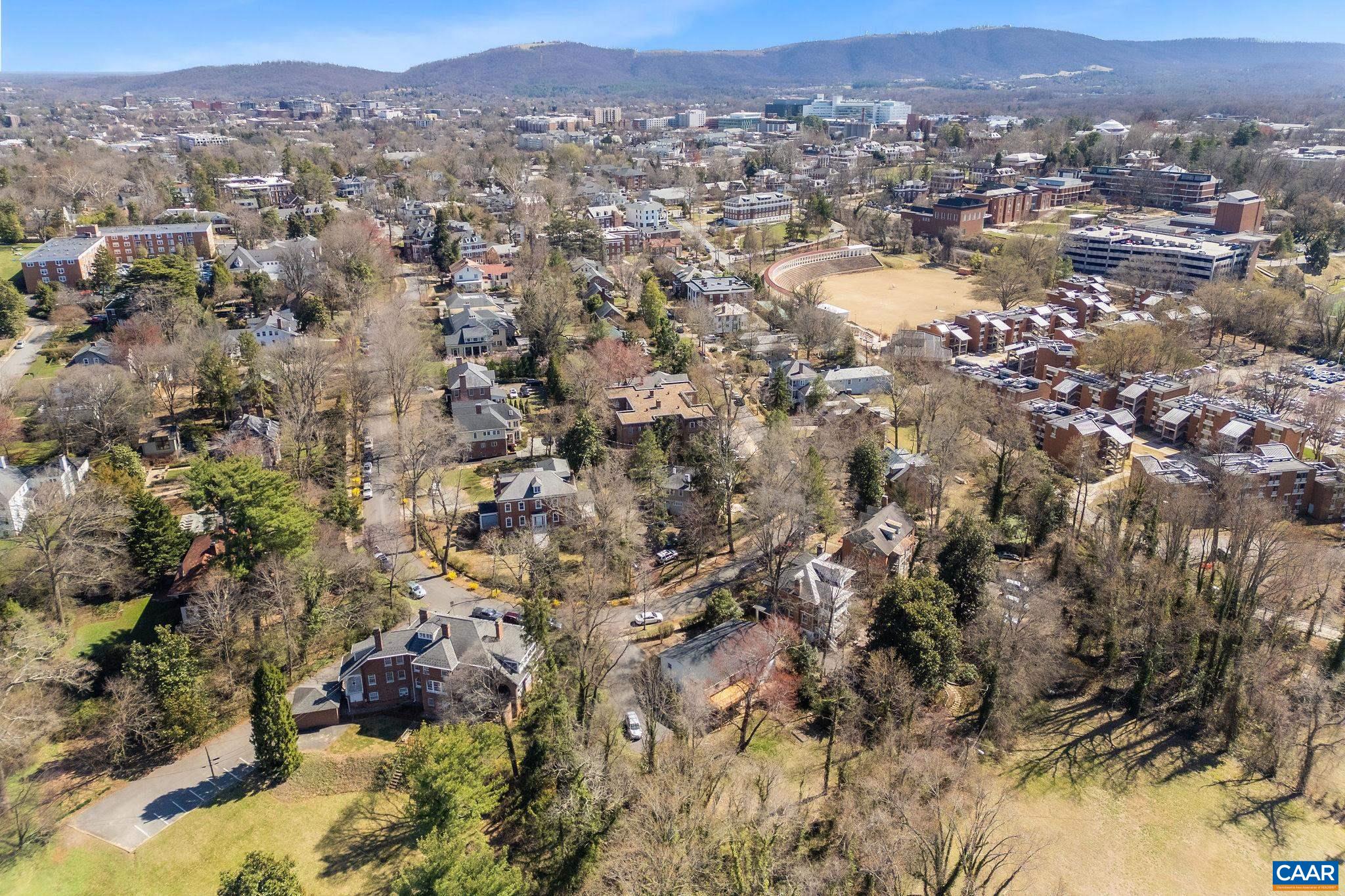 26 University Circle Charlottesville, VA 22903 - Photo 17 of 38 an aerial view of residential houses with city and green space