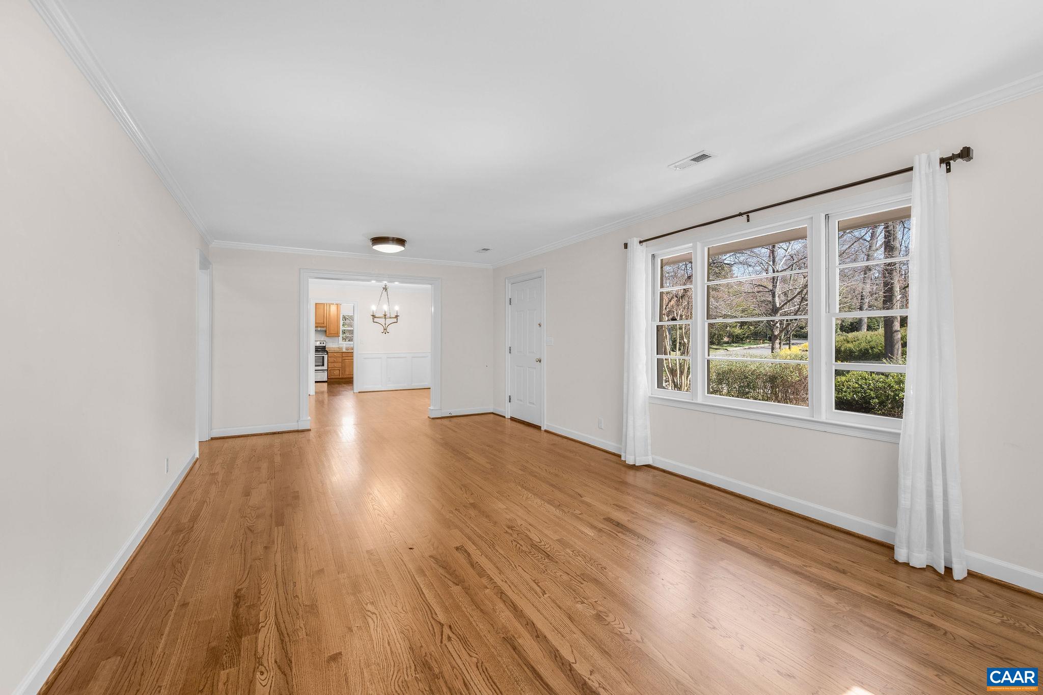 26 University Circle Charlottesville, VA 22903 - Photo 21 of 38 a view of empty room with wooden floor and fan