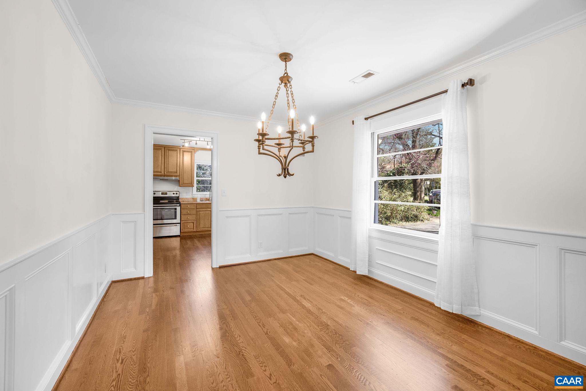 26 University Circle Charlottesville, VA 22903 - Photo 22 of 38 wooden floor in an empty room with a window