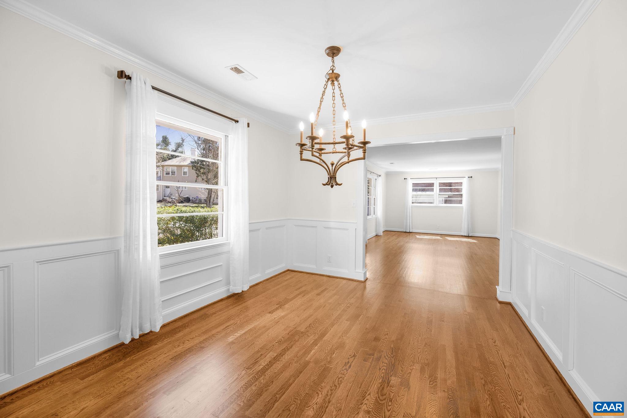 26 University Circle Charlottesville, VA 22903 - Photo 23 of 38 a view of empty room with wooden floor and fan