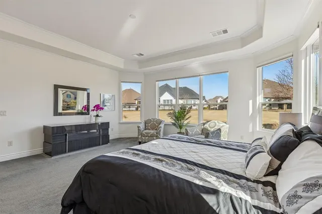 a bathroom with a double vanity sink mirror double and bathtub