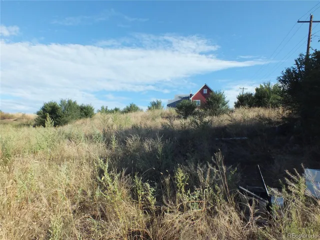 a view of a city street from a building