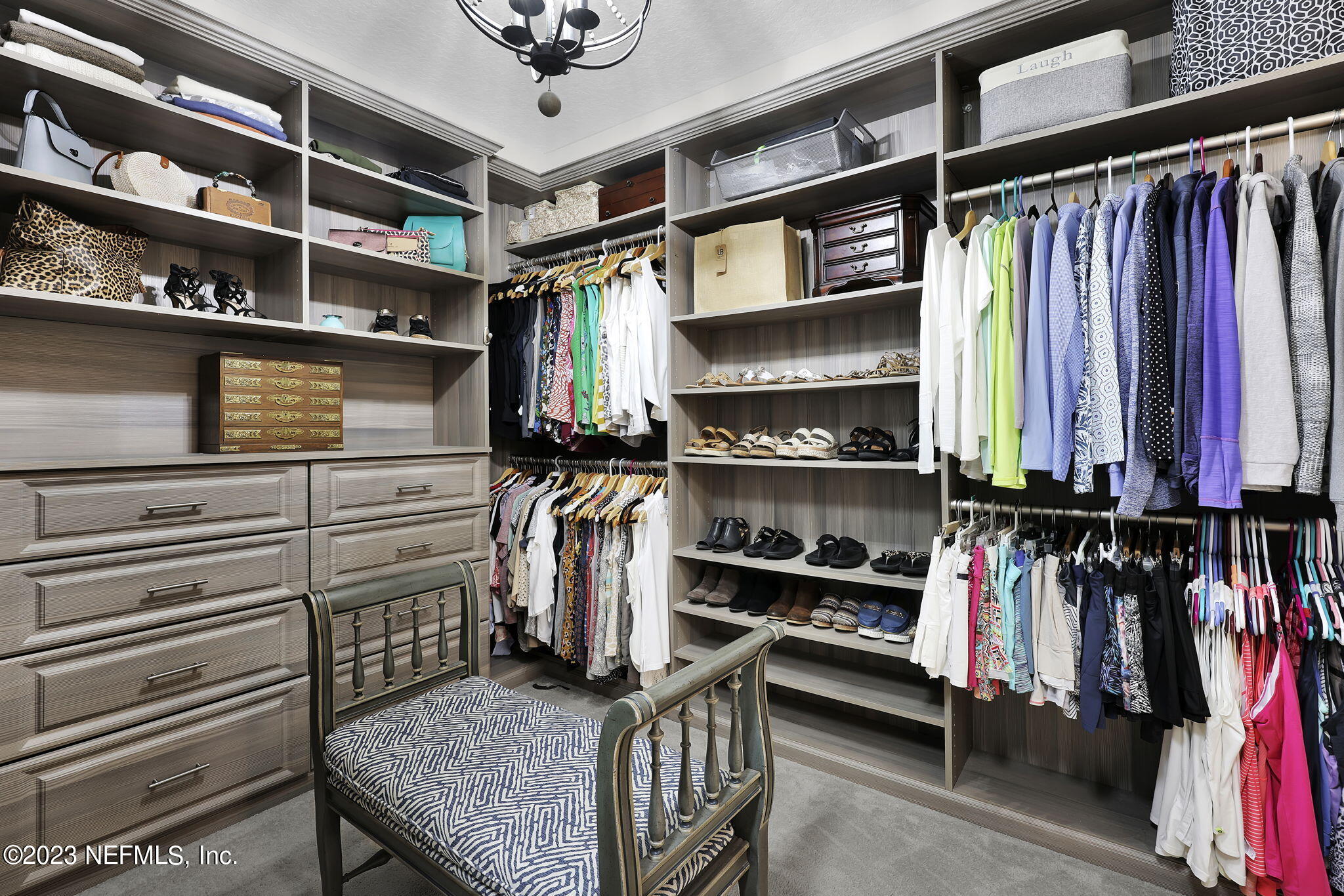 100 Tree Side Lane Ponte Vedra, FL 32081 - Photo 27 of 118 a view of walk in closet with clothes and shoes