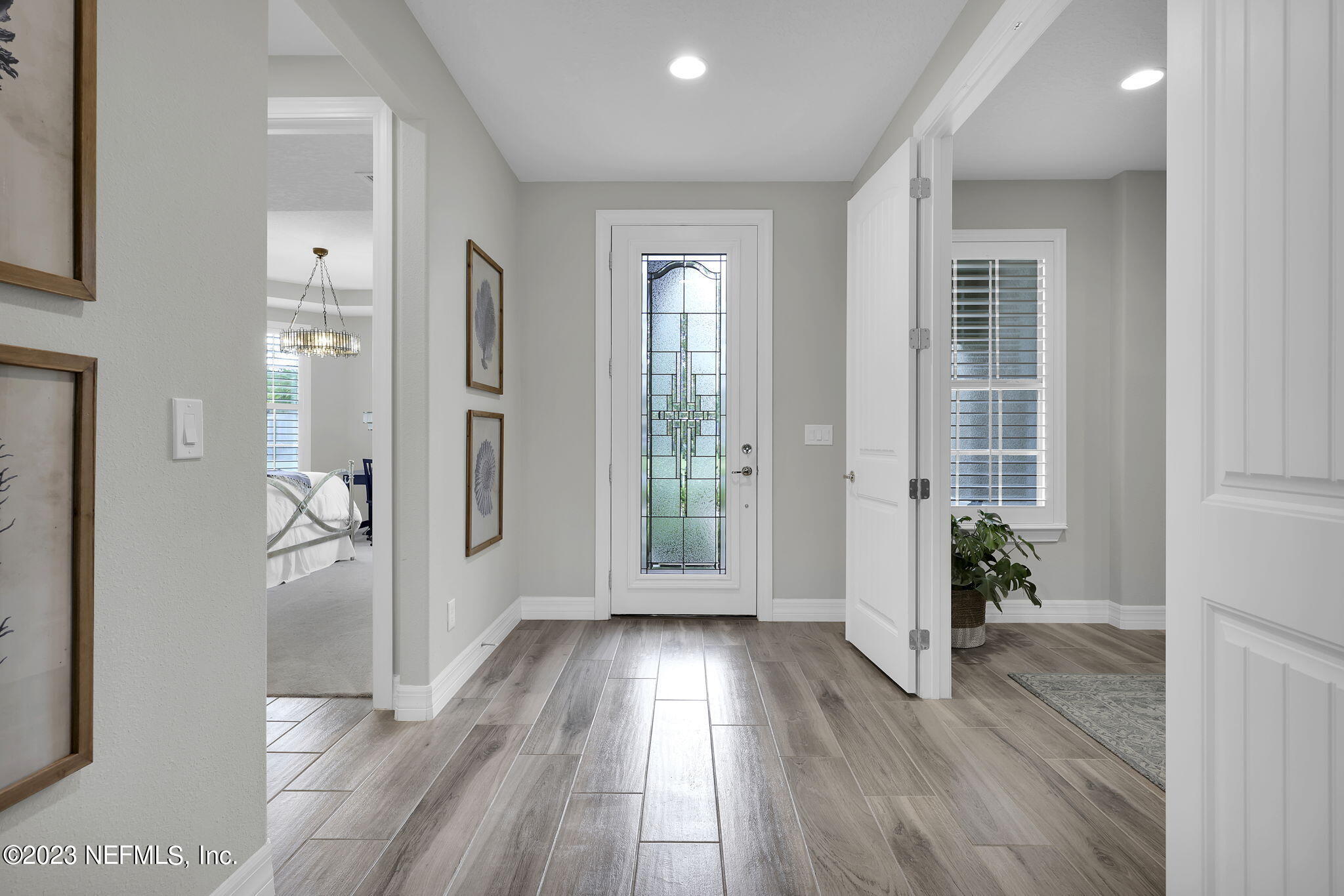 100 Tree Side Lane Ponte Vedra, FL 32081 - Photo 56 of 118 wooden floor in a hall with an entryway