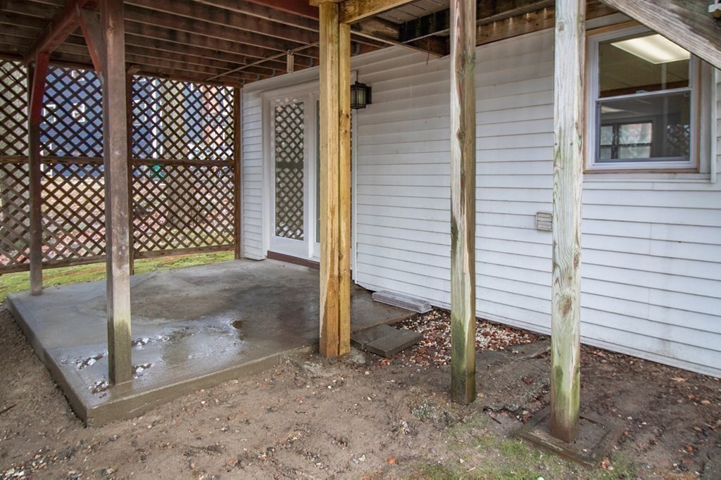 3 Colonial Road Sutton, MA 01590 - Photo 26 of 26 a view of a wooden door of the house